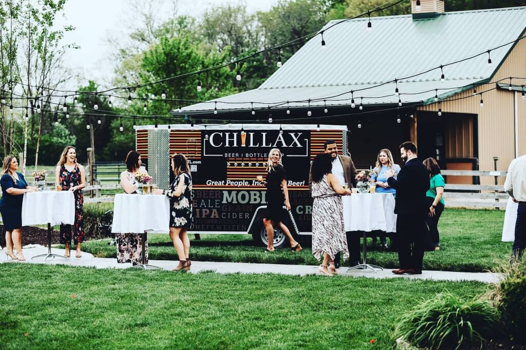 Chillax Mobile Bar craft beer trailer serving an outdoor event in St. Louis.